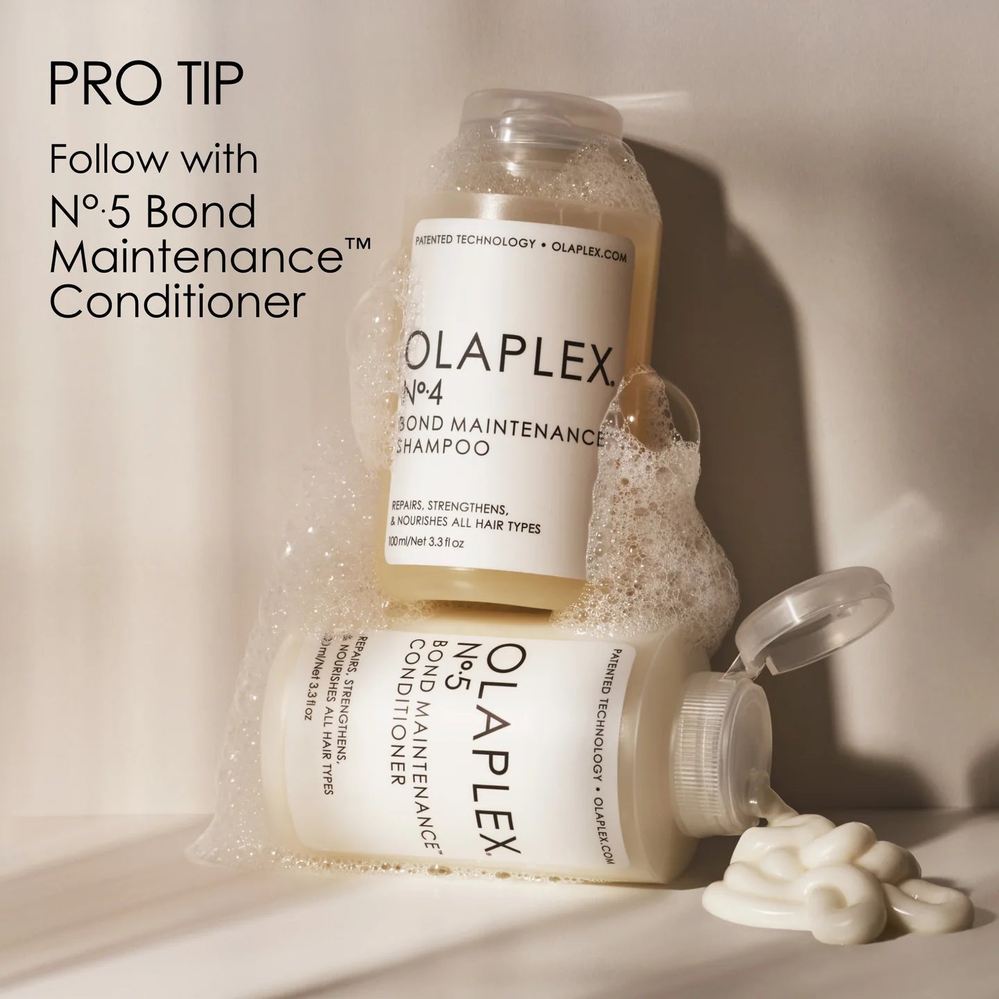 "Olaplex shampoo 4 - Voorzijde van de fles met het Olaplex-logo en productnaam."